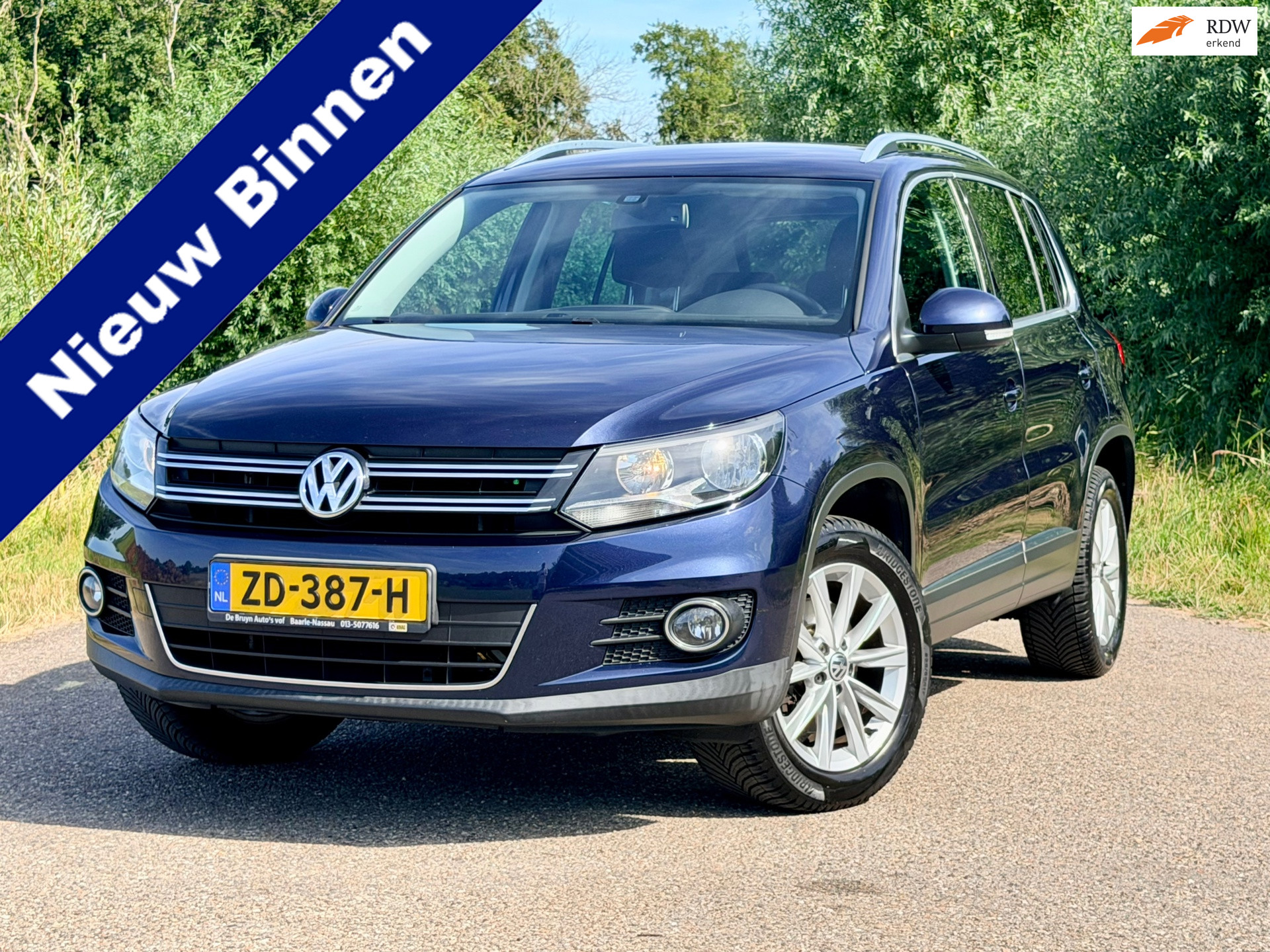 Volkswagen Tiguan 1.4 TSI Sport&Style 4motion Clima PDC Trekhaak 17'' Perfect Onderhouden 2013 - voorkant