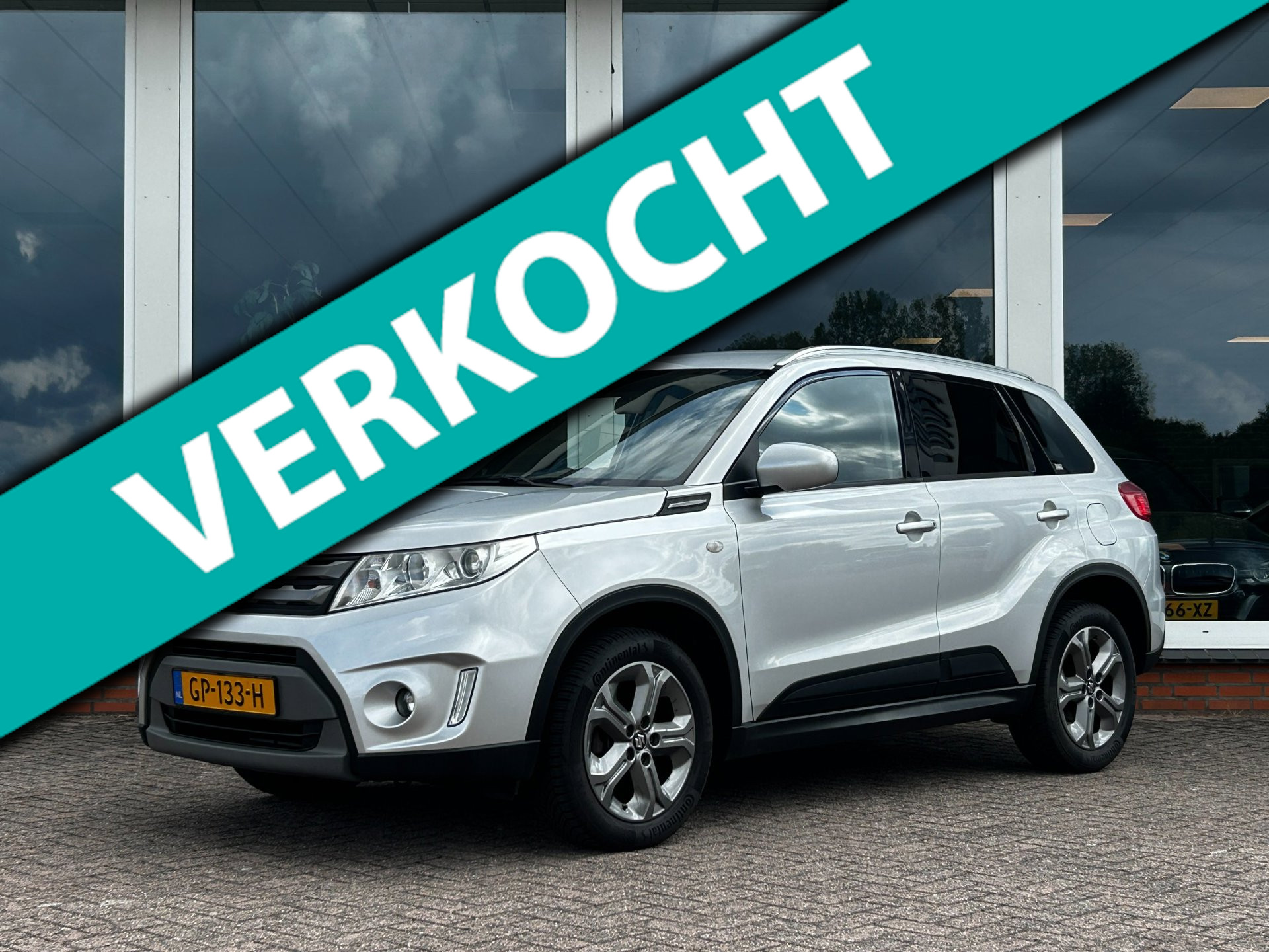 Suzuki Vitara 1.6 Exclusive - Navi - Camera - Trekhaak - LM 2015 - voorkant