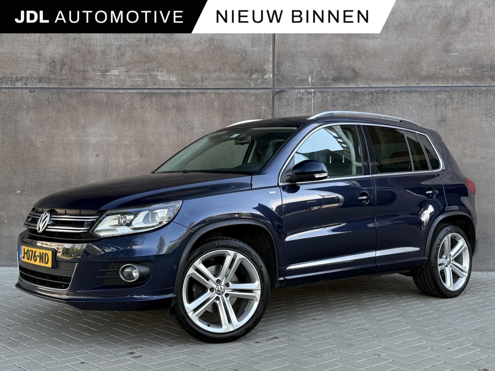 Volkswagen Tiguan 2.0 TSI Sport&Style 4Motion R-line | Trekhaak | 2200KG trekgewicht | Xenon | Climate control | Camera | 2014 - voorkant