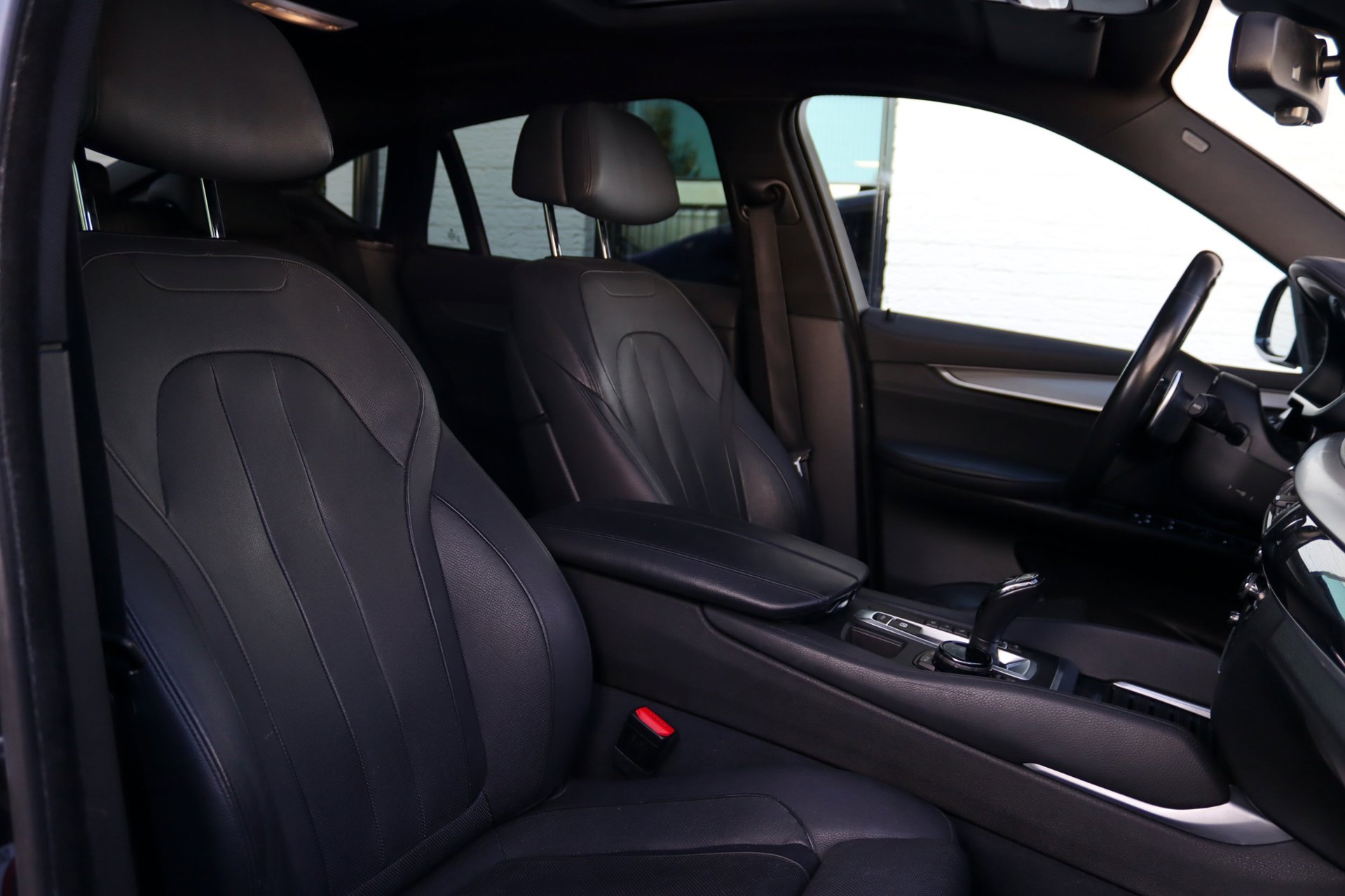 Foto van BMW X6 M50d