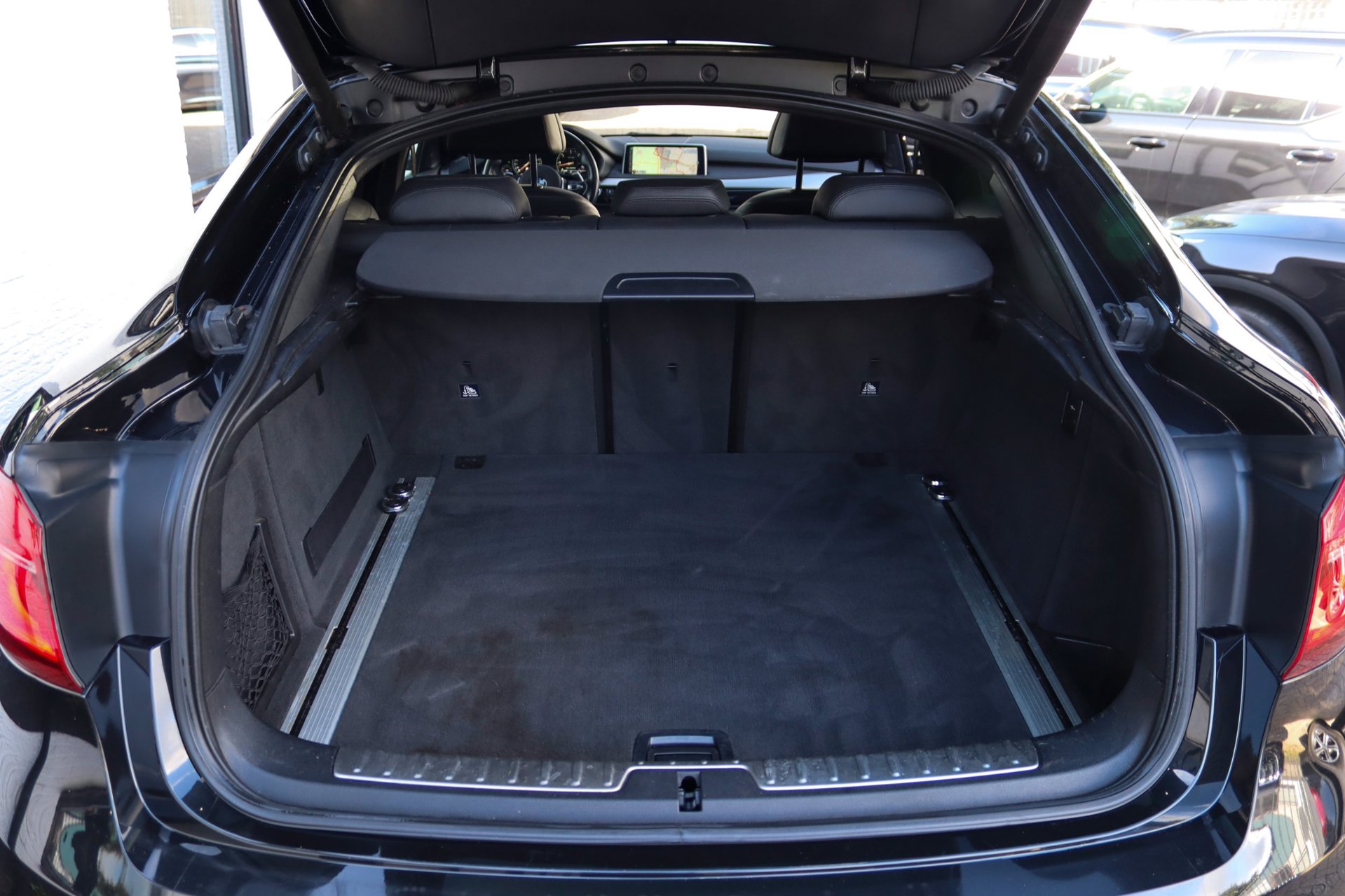 Foto van BMW X6 M50d