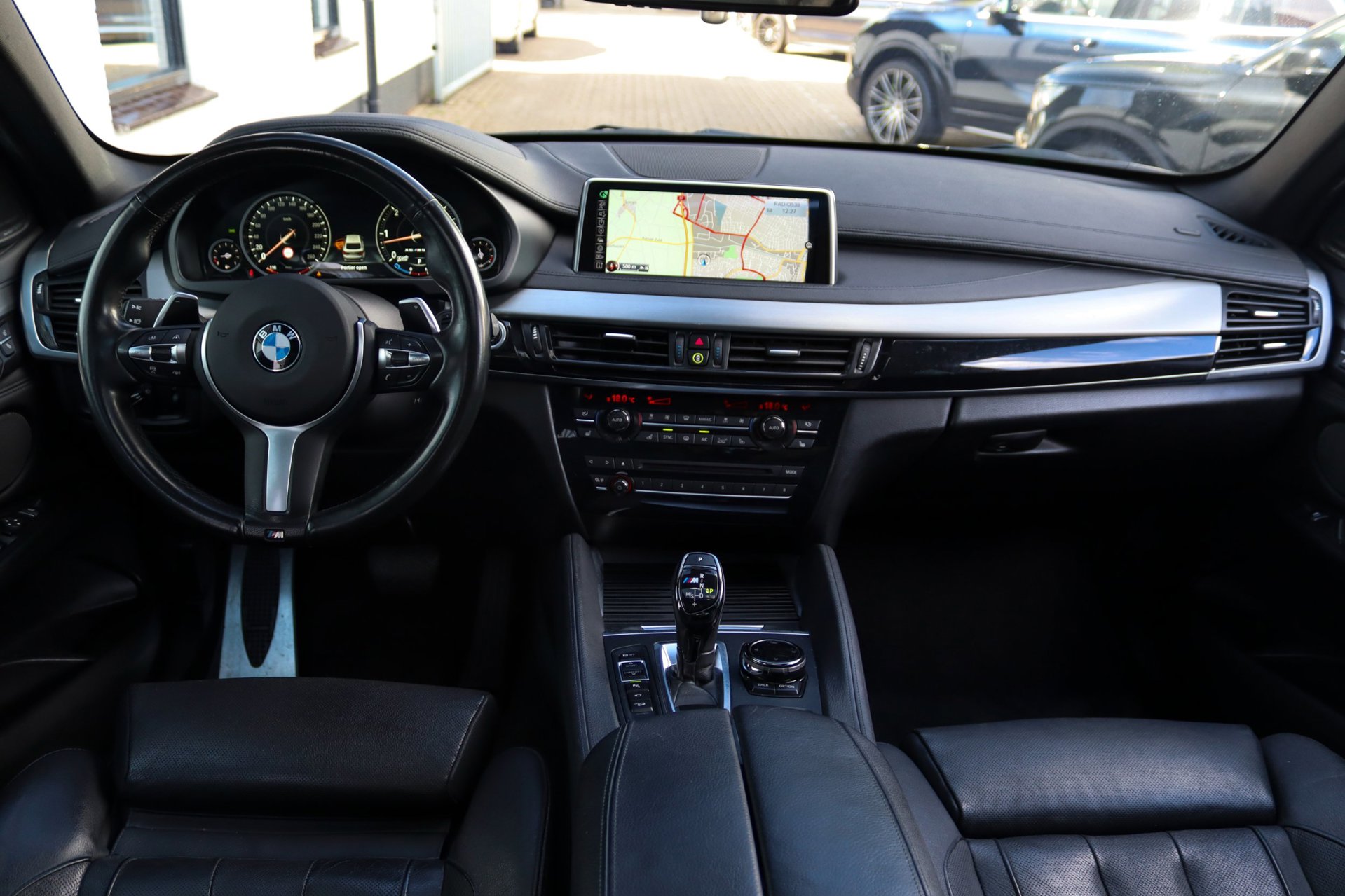 Foto van BMW X6 M50d