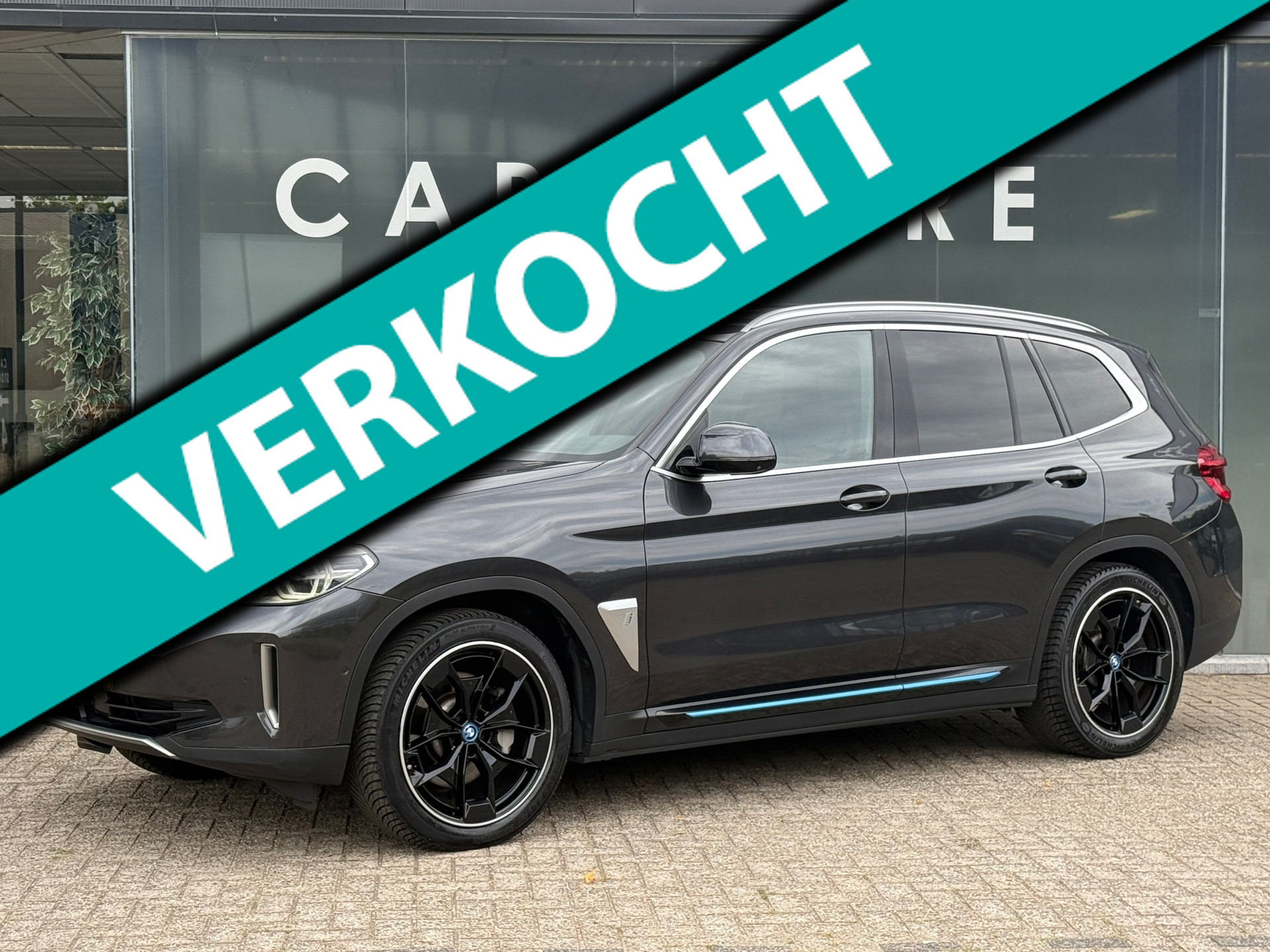 BMW Ix3 High Executive 80 kWh 98% SOH Pano|Leder|Trekhaak|360cam 2021 - voorkant