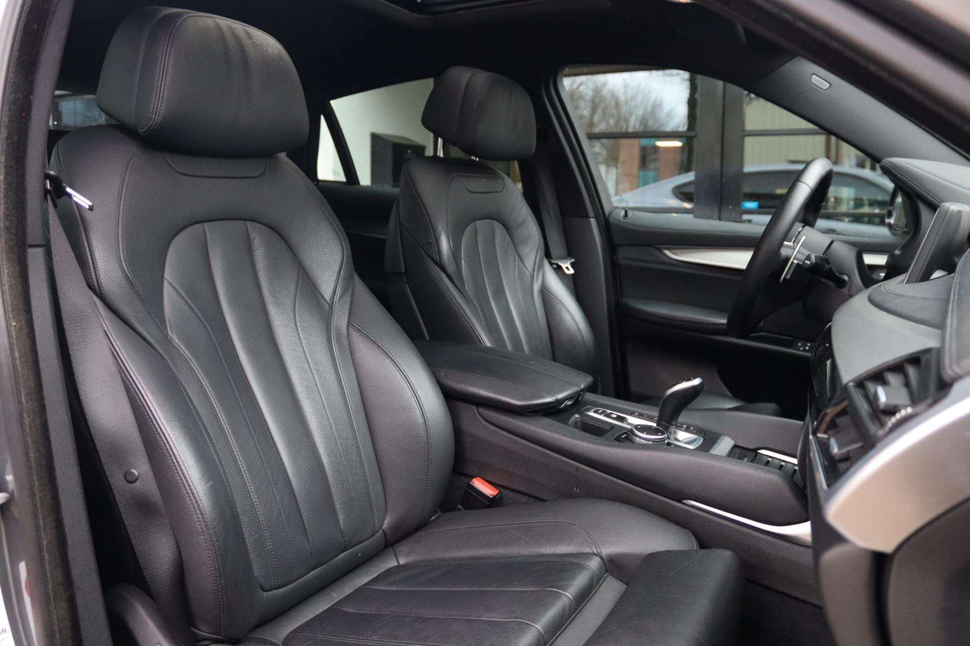 Foto van BMW X6 M50d