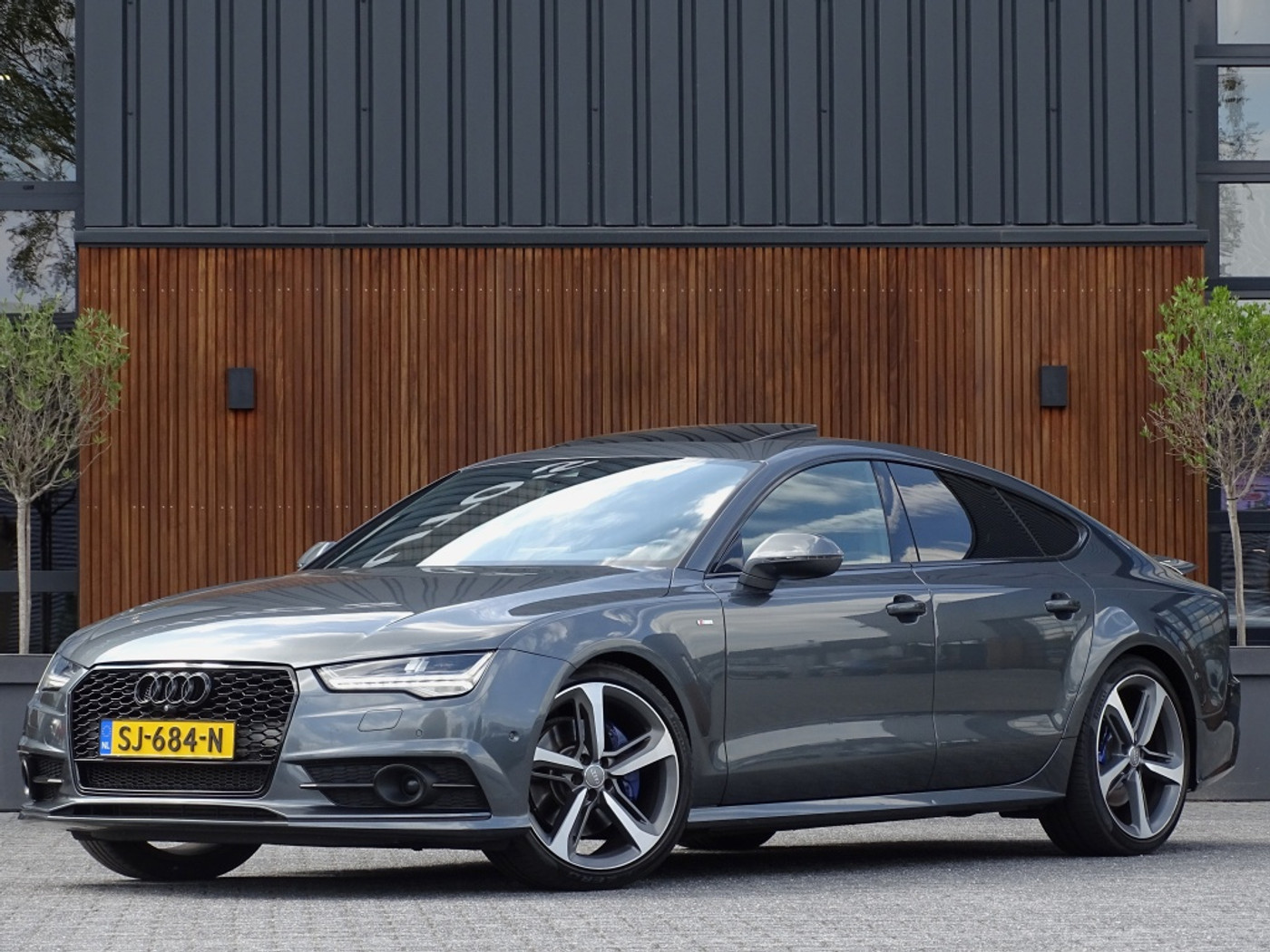 Audi A7 Sportback 3.0 TDI V6T 272PK Quattro / S-Edition / Bose / LED 2015 - voorkant