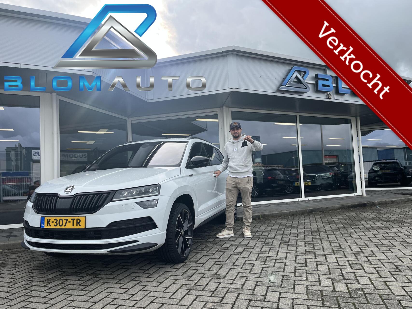 Skoda Karoq 1.5 TSI ACT Sportline PANO+ACC+KEYLESS NL AUTO 2021 - voorkant