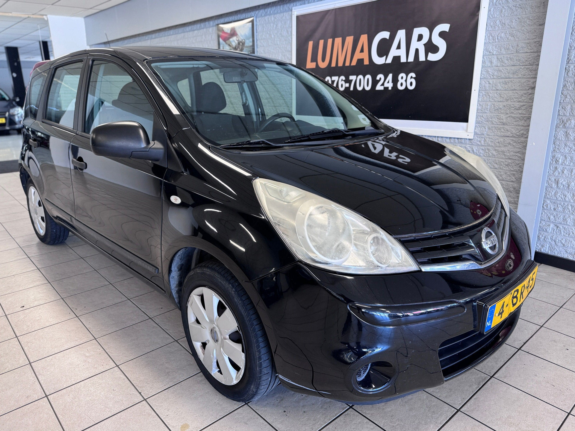 Nissan Nissan Note 1.4 Visia | Airco | Trekhaak | APK aanwezig | 2011 - voorkant