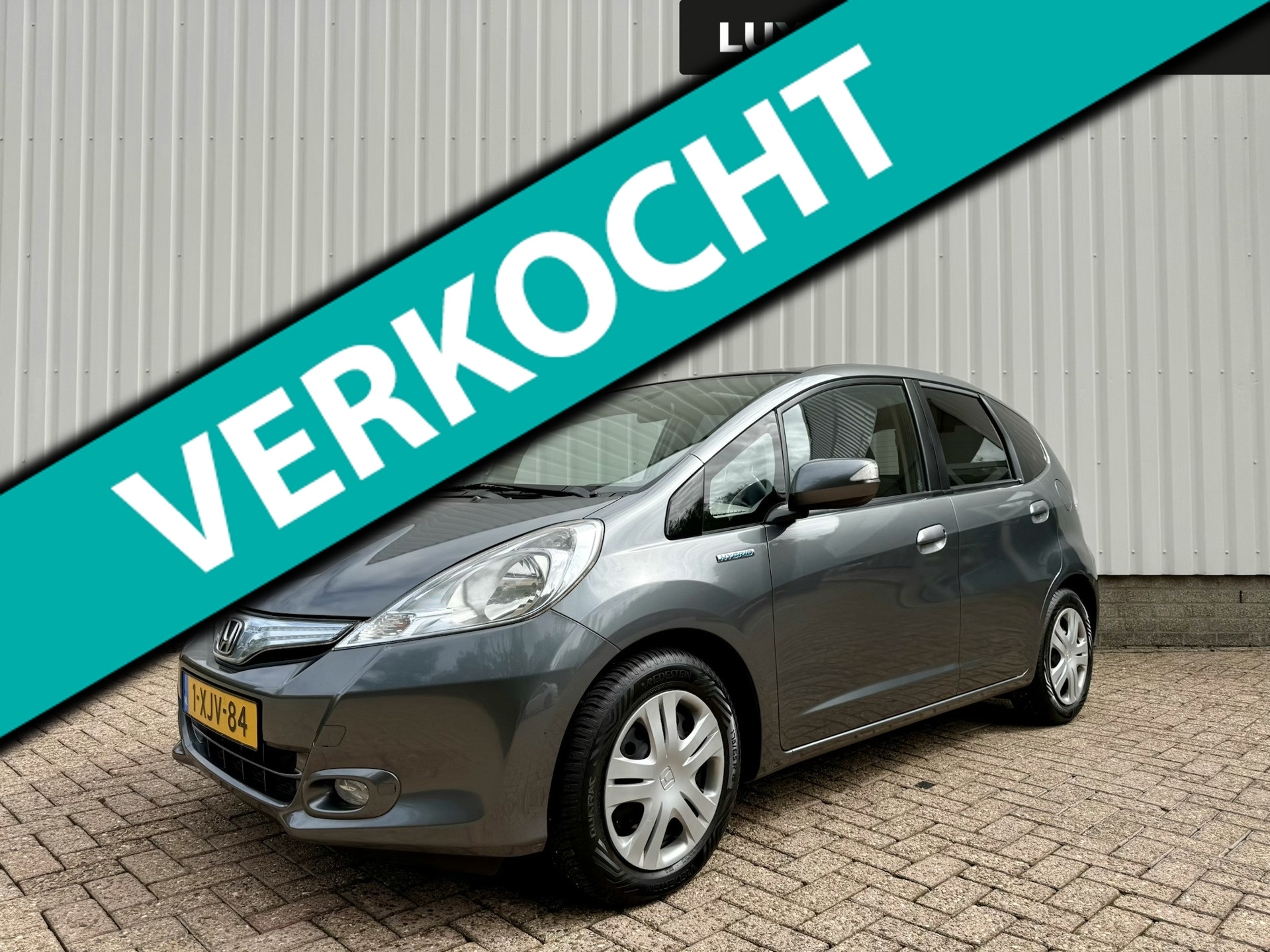 Honda Jazz Hybrid 1.4 Hybrid Elegance, Pano, Cruise, Climate Control, 4-seizoenenbanden 2014 - voorkant