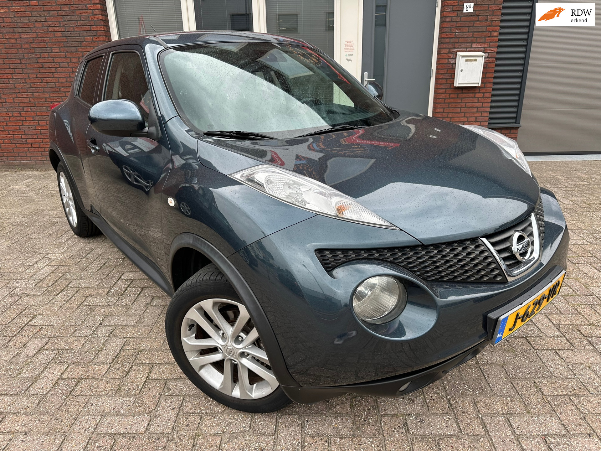 Nissan Nissan Juke 1.6 Tekna / Navi / Camera / Clima / Cruise / AUT / LM 2011 - voorkant