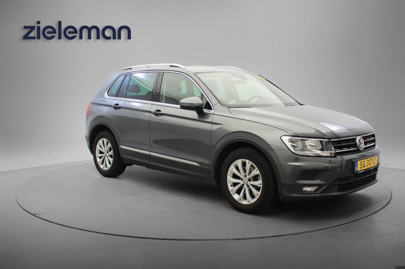 Volkswagen Tiguan 1.4 TSI ATC Comfortline Business - Clima, Carplay, Trekhaak 2018 - voorkant