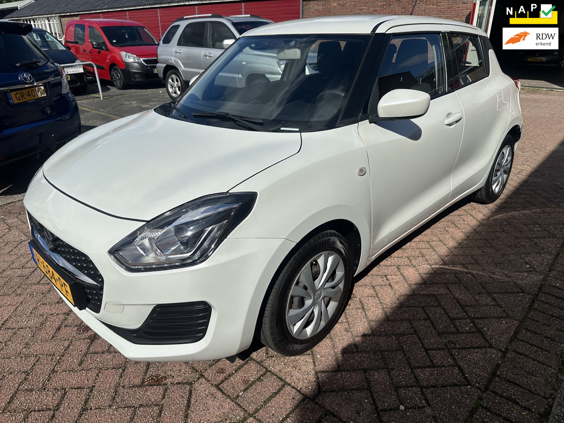 Suzuki Swift 1.2 Comfort Smart Hybrid AIRCO PDC CC NAP APK 2022 - voorkant