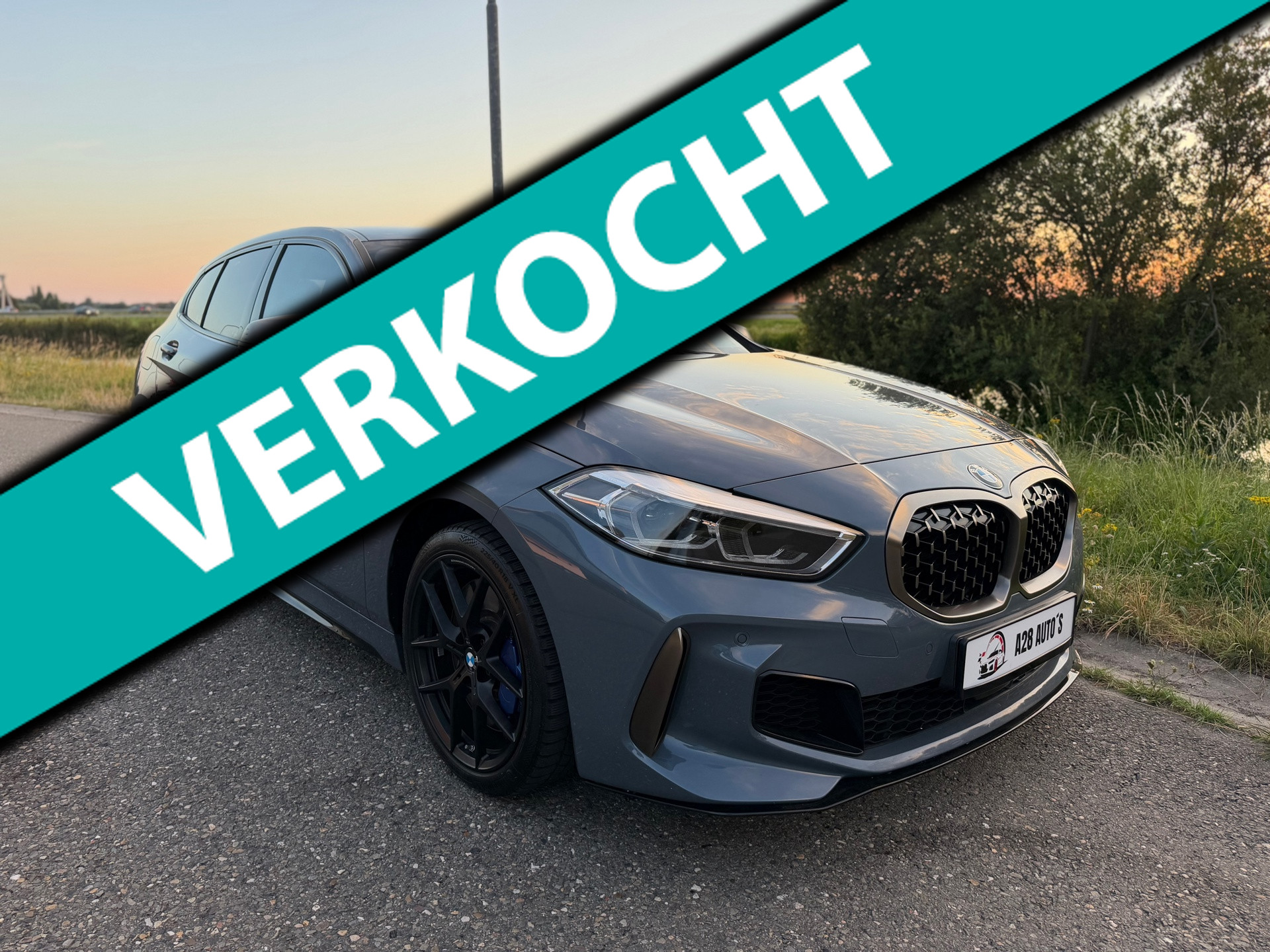 BMW 1-serie M135i xDrive Executive | Head up CarPlay| Automaat | NAP | Memory 2020 - voorkant
