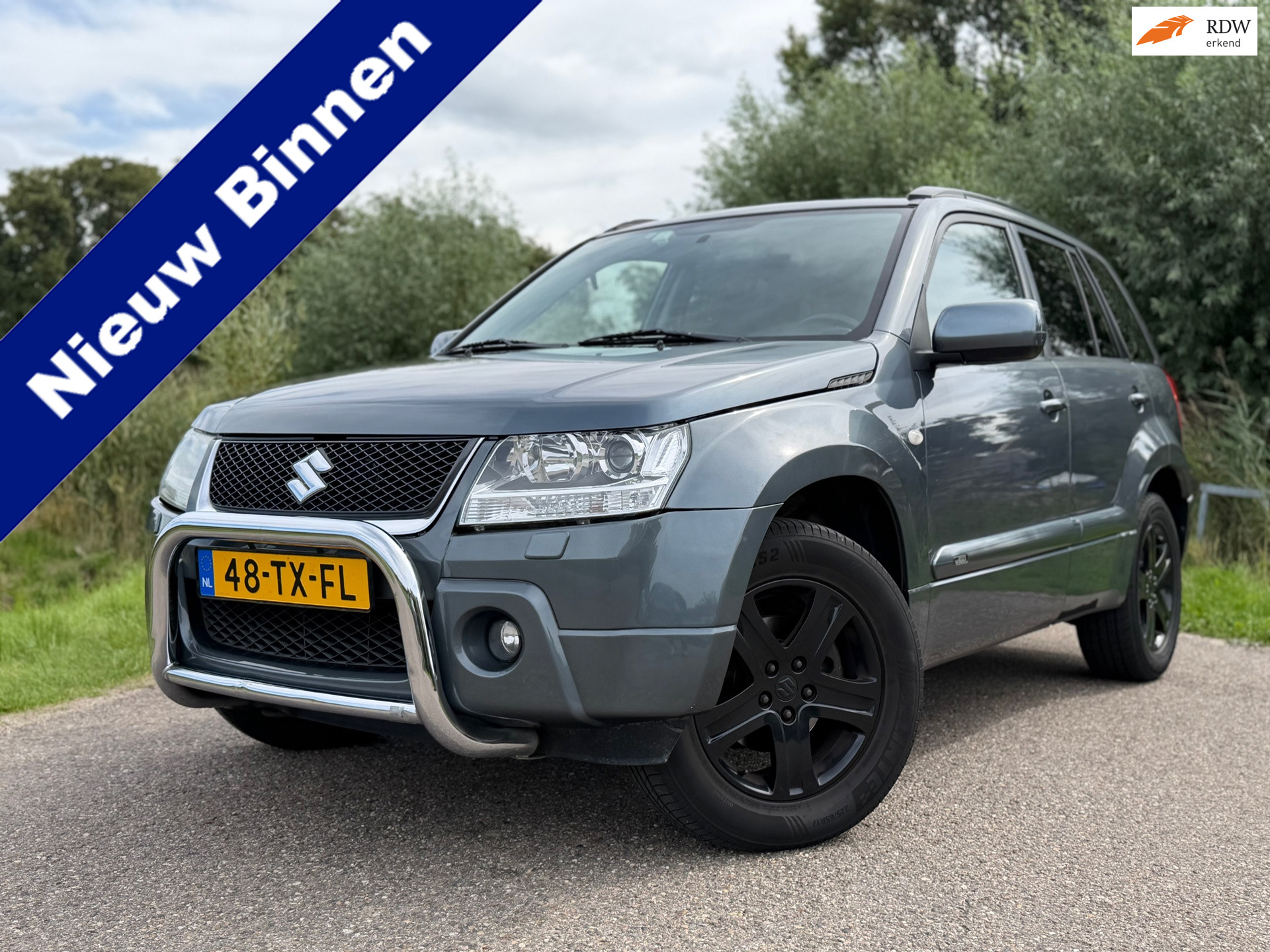 Suzuki Grand Vitara 2.0-16V High Executive Automaat / Schuif-/Kanteldak / Leder / Clima / Stoelverwarming / 17" Velgen / Cruise / 2007 - voorkant