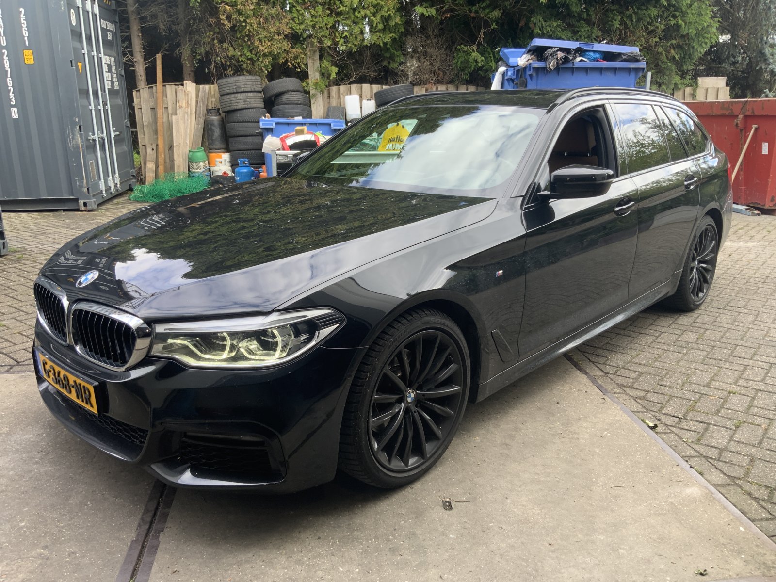 BMW 5-serie Touring 520i High Ex. Ed. 2019 - voorkant