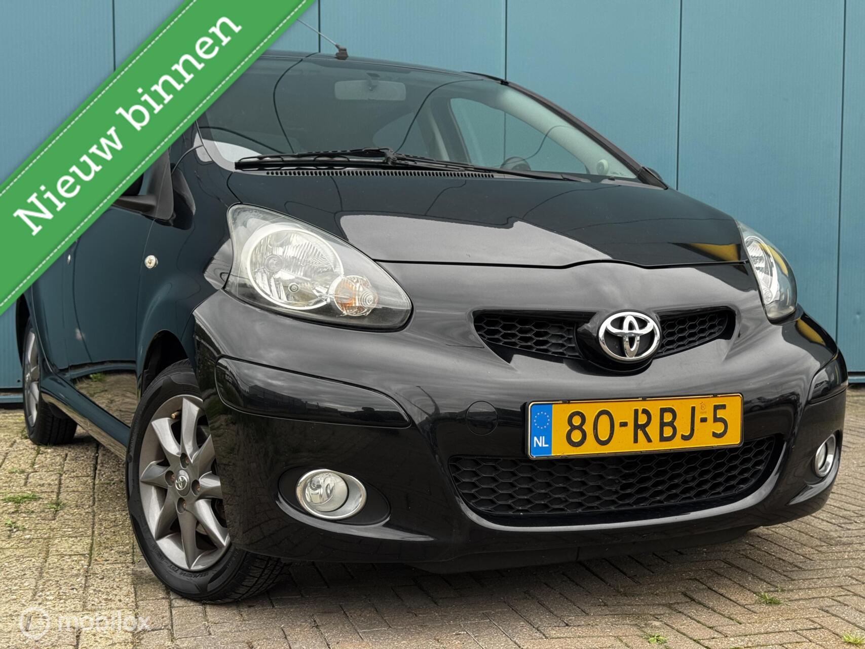 Toyota Toyota Aygo 1.0-12V Dynamic Navigator 5Drs Automaat Airco LMV APK 08-09-2027 2011 - voorkant