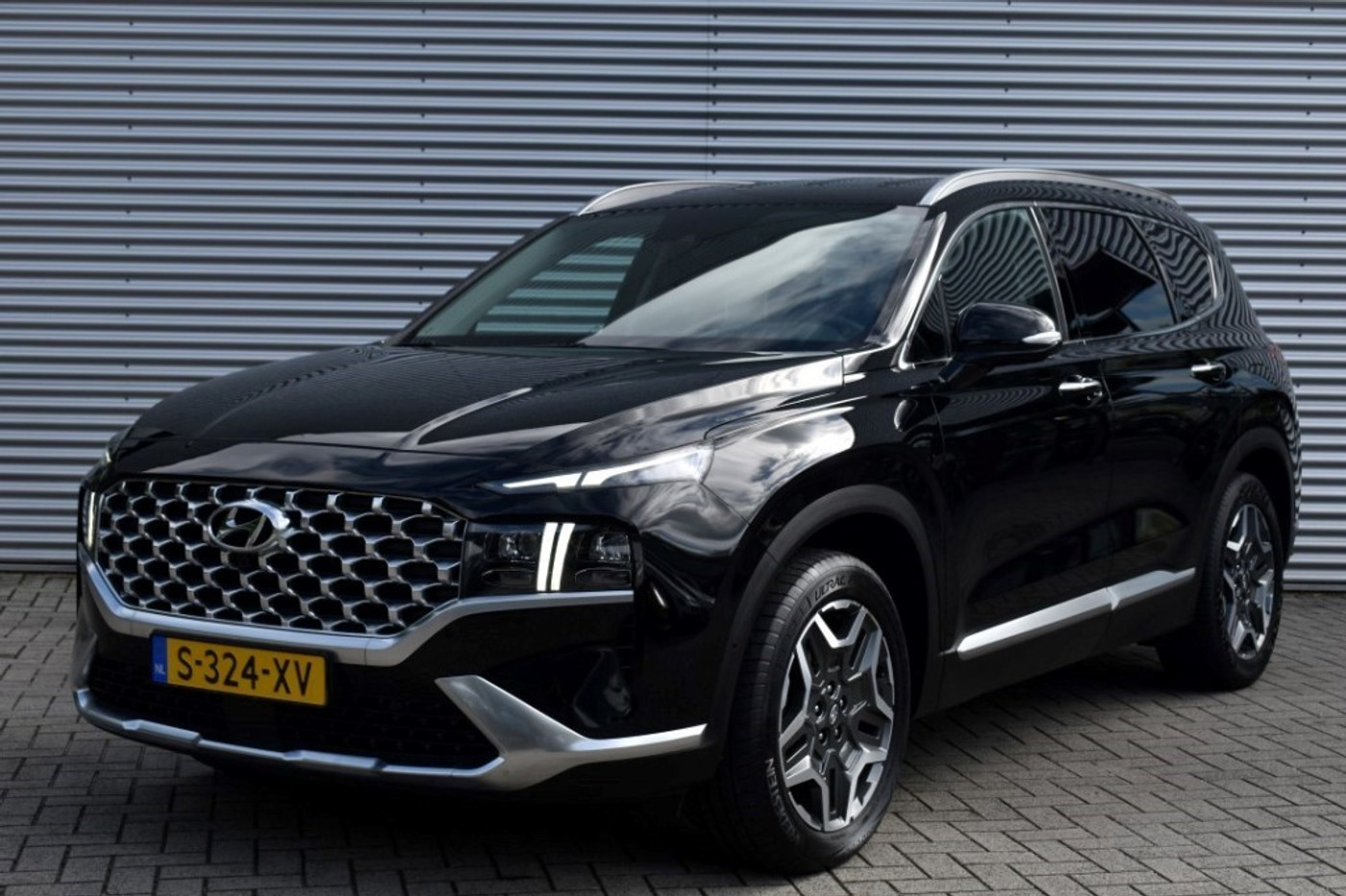Hyundai Santa Fe 1.6 T-GDI HEV 7P. PREMIUM / AFN. HAAK / ADAP. CRUISE / 360 CAMERA 2023 - voorkant