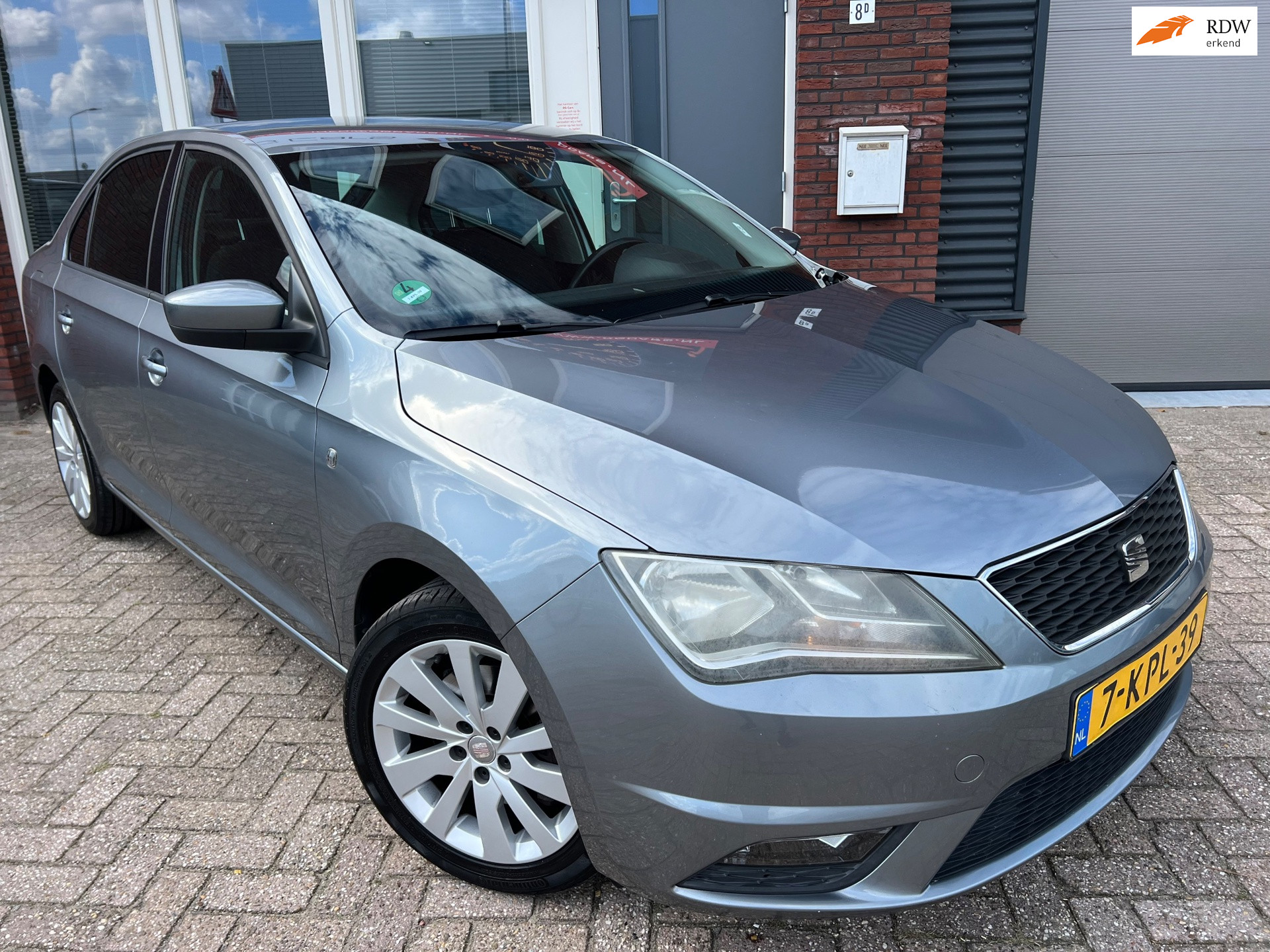 Seat Toledo 1.2 TSI Businessline High / Navi / PDC / Cruise / Clima / NAP / Nette Auto / Volledig onderhouden 2013 - voorkant
