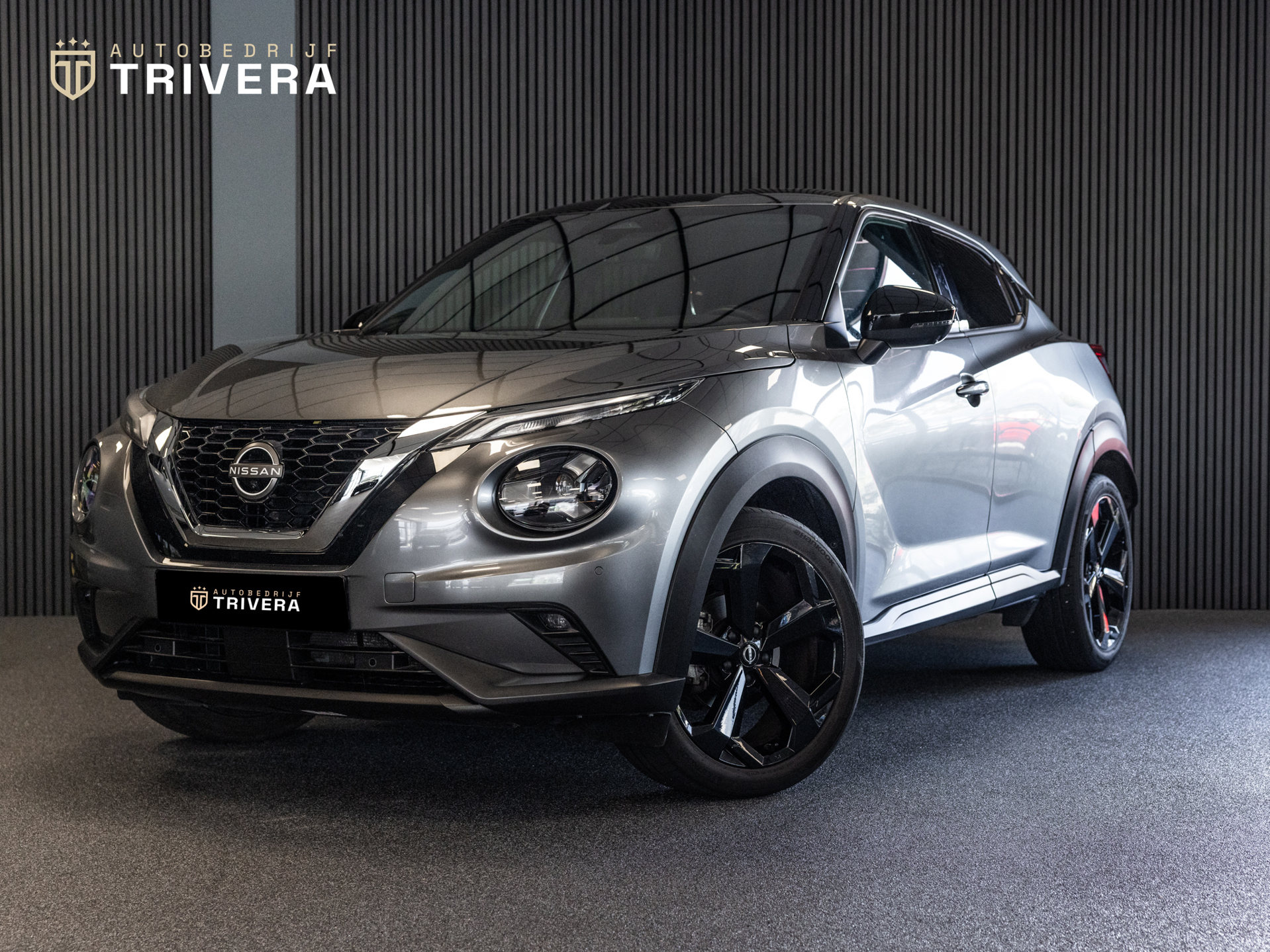 Nissan Juke 1.0 DIG-T Tekna 116PK l 360° CAM l NAV l 1ste eig. l Climate l BTW Auto l Zeer lage KM 2024 - voorkant
