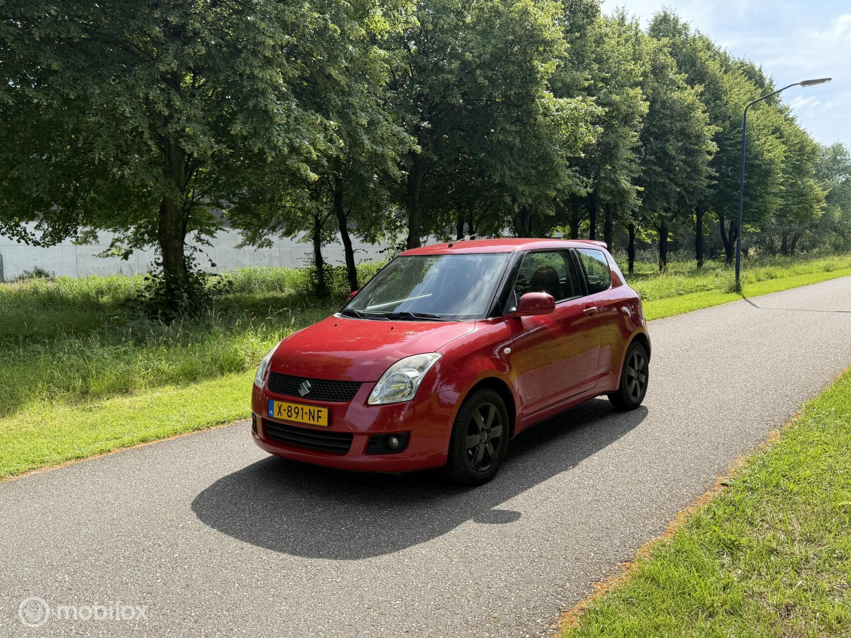 Suzuki Swift 1.3 Base*APK 1/27*CLIMATE CONTROL*STOELVERWARMING 2009 - voorkant