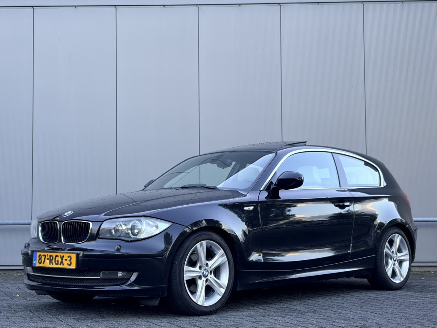 BMW 116i 116i EffDyn - nap! - airco - navi - cruise - 2011 - voorkant