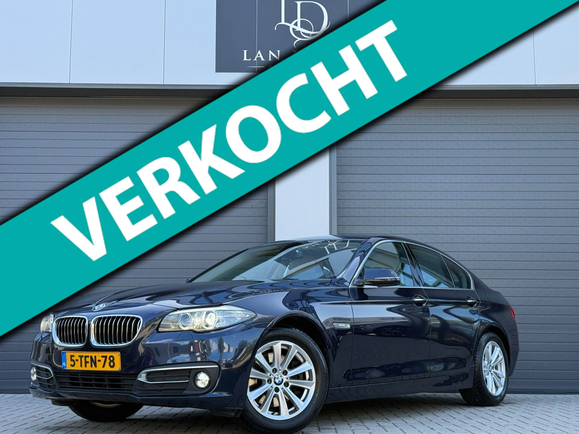 BMW 520i 520i Luxury Edition / AUTOMAAT / NAP / TREKHAAK 2014 - voorkant