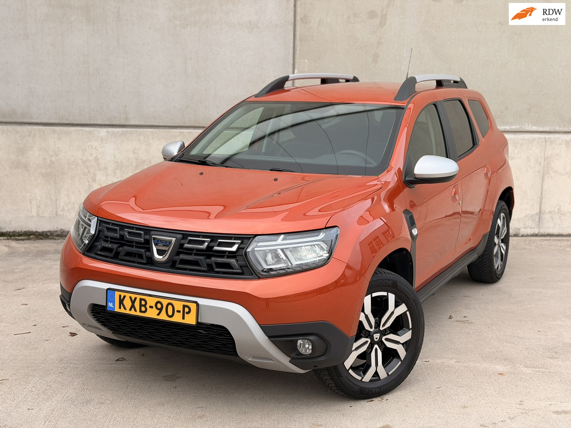 Dacia Duster 1.3 TCe Prestige Automaat Trekhaak CarPlay Camera DAB Cruise 2021 - voorkant