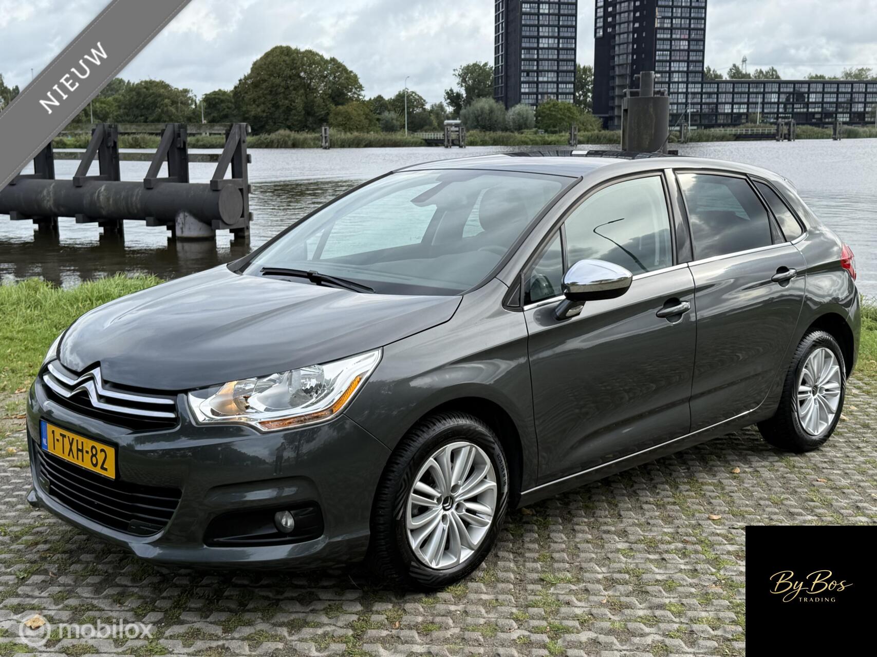 Citroen C4 1.2 Exclusive 1e Eig. Dealer. Navi Clima Cruise PDC 2014 - voorkant