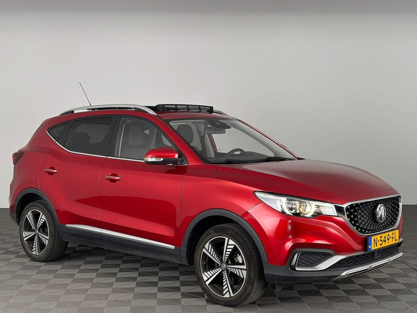 MG MG ZS Ev EV Luxury 45 kWh | LEDER | SCHUIFDAK ✅ 1e Eigenaar 2021 - voorkant