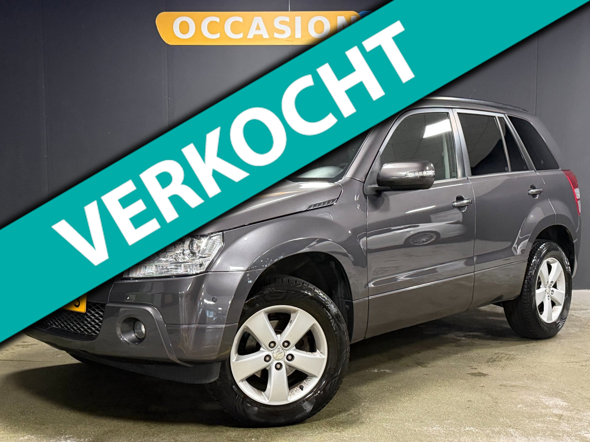 Suzuki Grand Vitara 2.4 Exclusive 4x4 |PDC|CLIMATE|TREKH|MULTIMEDIA|STOELV 2010 - voorkant