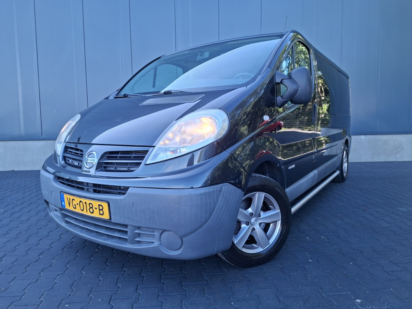 Nissan Nissan Primastar 2.0 dCi L2H1 Bus | 5 persoons | Airco | Nette bus | Bluetooth | Trekhaak | Cruise control | 2013 - voorkant