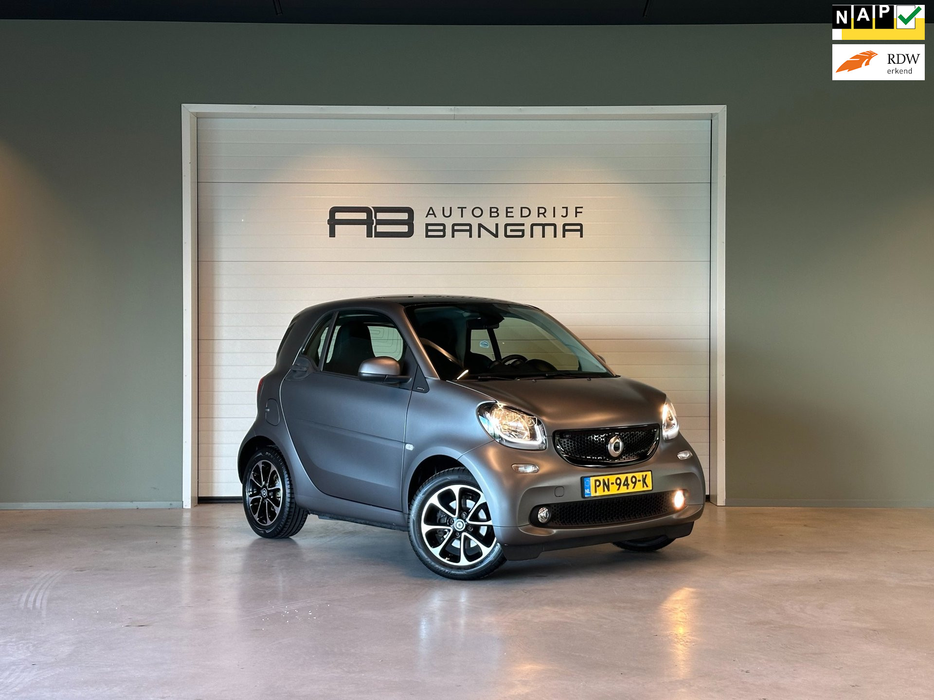 Smart Fortwo Coupe 1.0 AUTOMAAT PASSION-uitv|CLIMA AIRCO|NAVIGATIE|CRUISE CONTROL|LM-VELGEN|19.725 km NAP!!|incl.nieuwe APK+OH-BEURT 2017 - voorkant