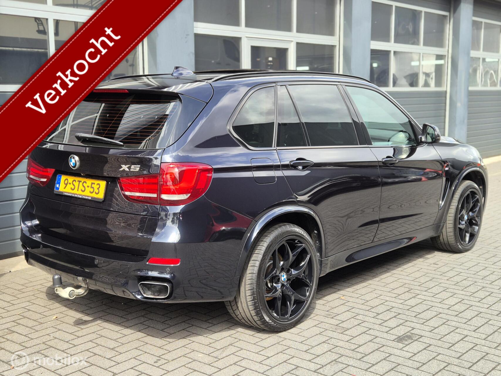 Foto van BMW X5 Xdrive50i