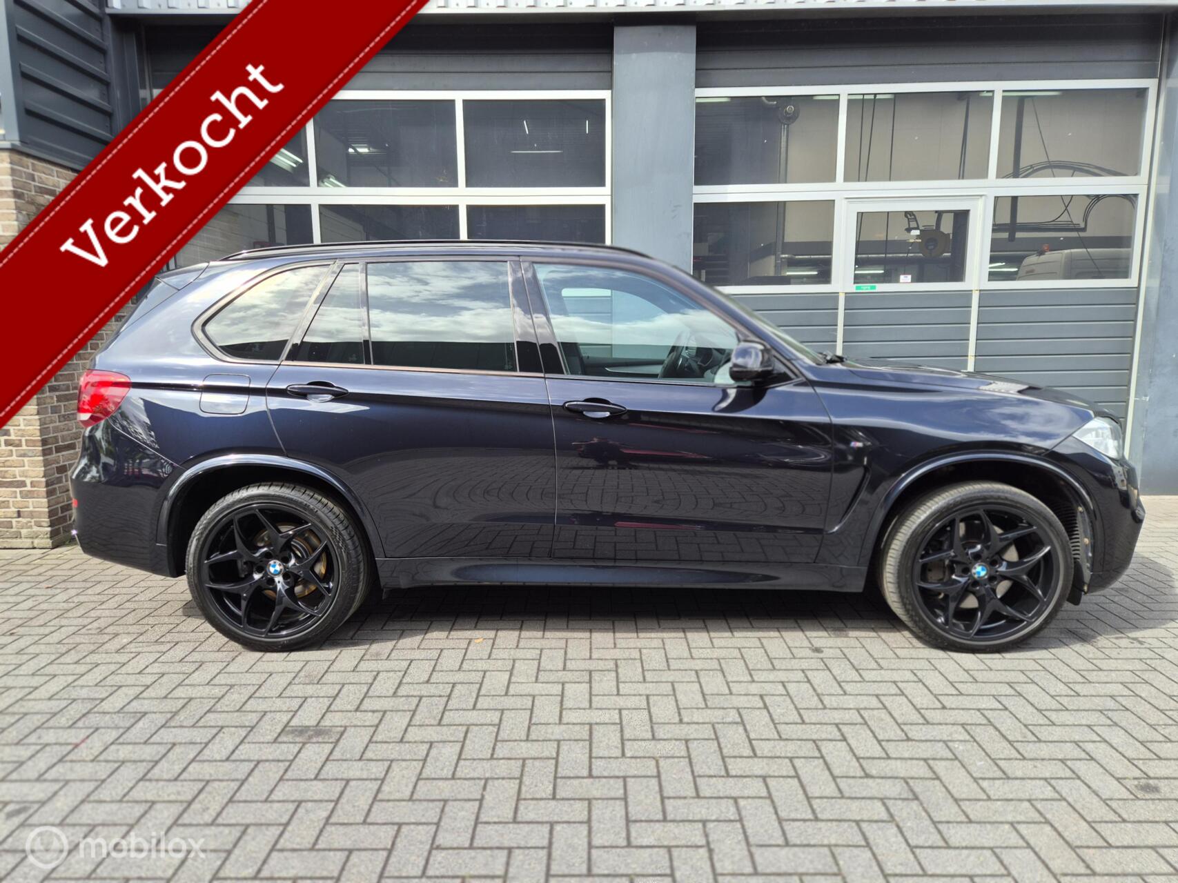 Foto van BMW X5 Xdrive50i