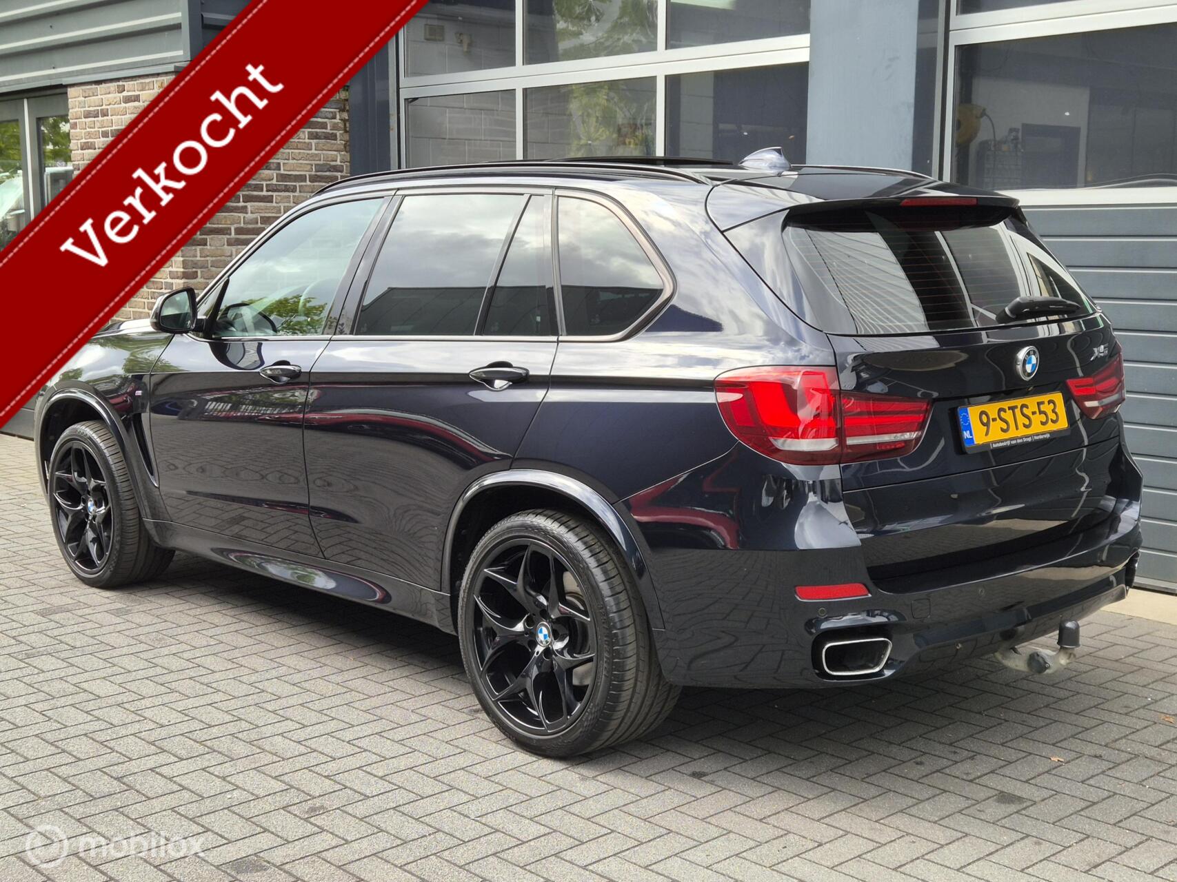Foto van BMW X5 Xdrive50i