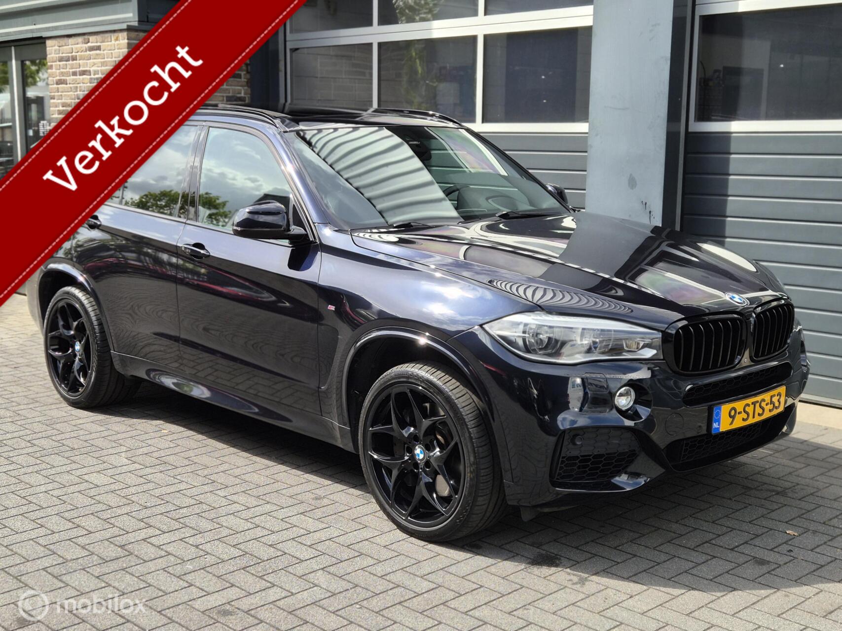 Foto van BMW X5 Xdrive50i