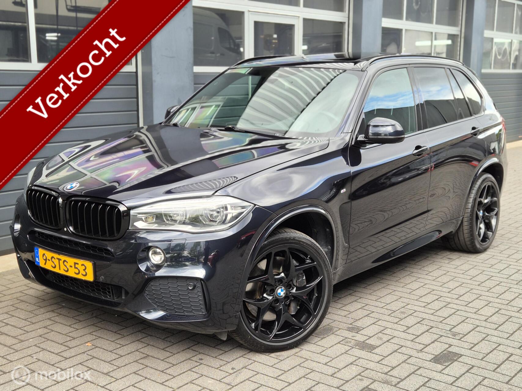 BMW X5 Xdrive50i xDrive50i V8 High Executive 7p. M-pakket | SOFTCLOSE | PANO | 360CAMERA | LEDER | MEMORY | HUD | 2013 - voorkant