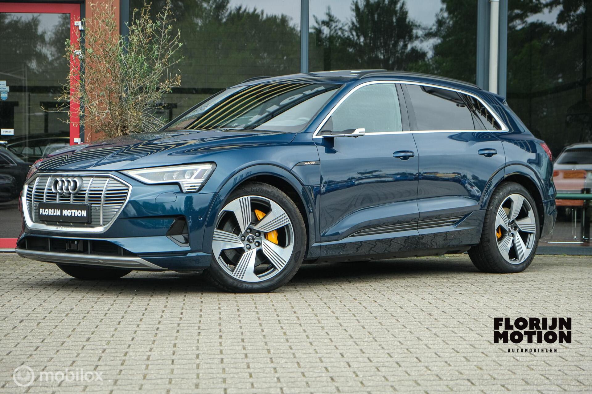 Audi Audi E-tron 55 quattro Business edition Plus 95 kWh | Pano | ACC | HUD | B&O | Luchtvering | Stoelverwarming voor en achter | Trekhaak | Ambient | 360  | Clima achterin | Galaxisblauw metallic 2018 - voorkant