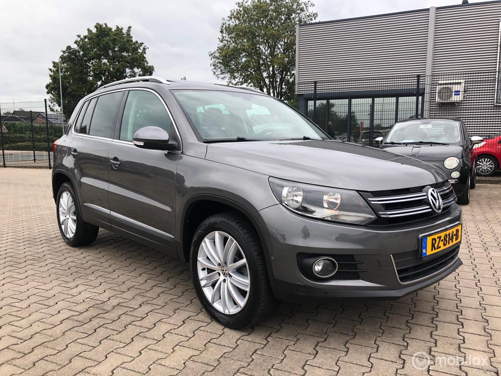 Volkswagen Tiguan 1.4 TSI Sport&Style|160pk|Pano|Airco|Cruise|Alcantara| 2012 - voorkant