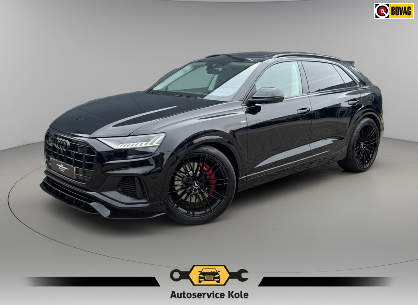 Audi Q8 55 TFSI E 55 TFSI quattro * S-line * Panoramadak * Dealer onderh. * 2022 - voorkant