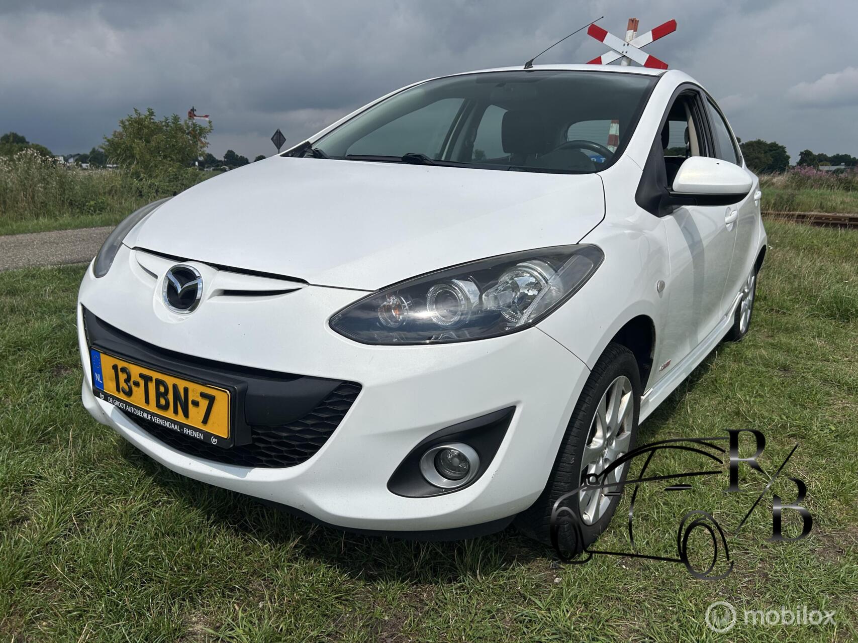 Mazda 2 1.3 BIFUEL GT-M Line AIRCO NIEUWE APK STOELVERW 2012 - voorkant