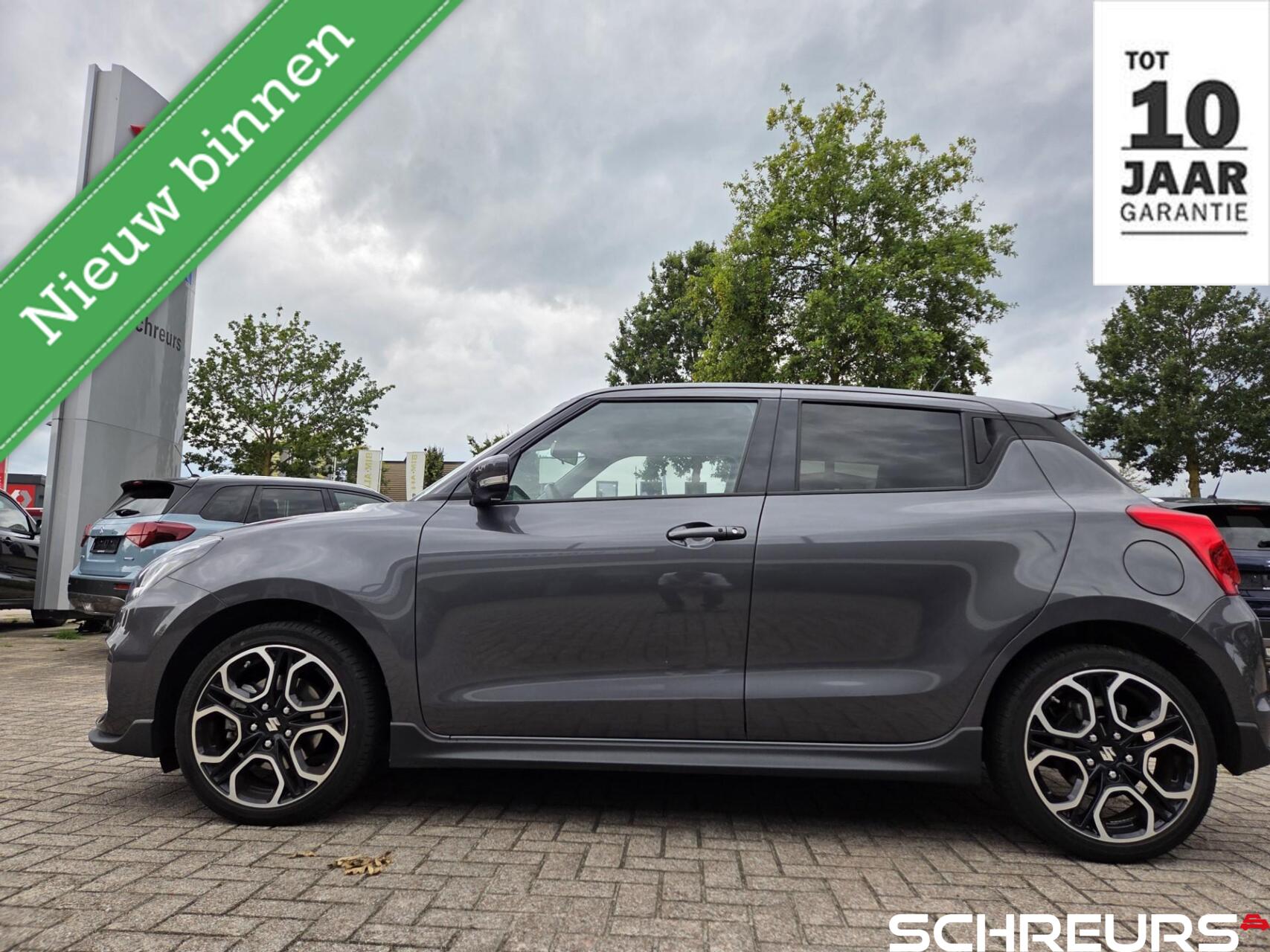 Suzuki Swift 1.4 Sport Smart Hybrid|1ste eigenaar|Nl. Auto| Tot 10 jaar garantie!!!|Rijklaar prijs 2024 - voorkant