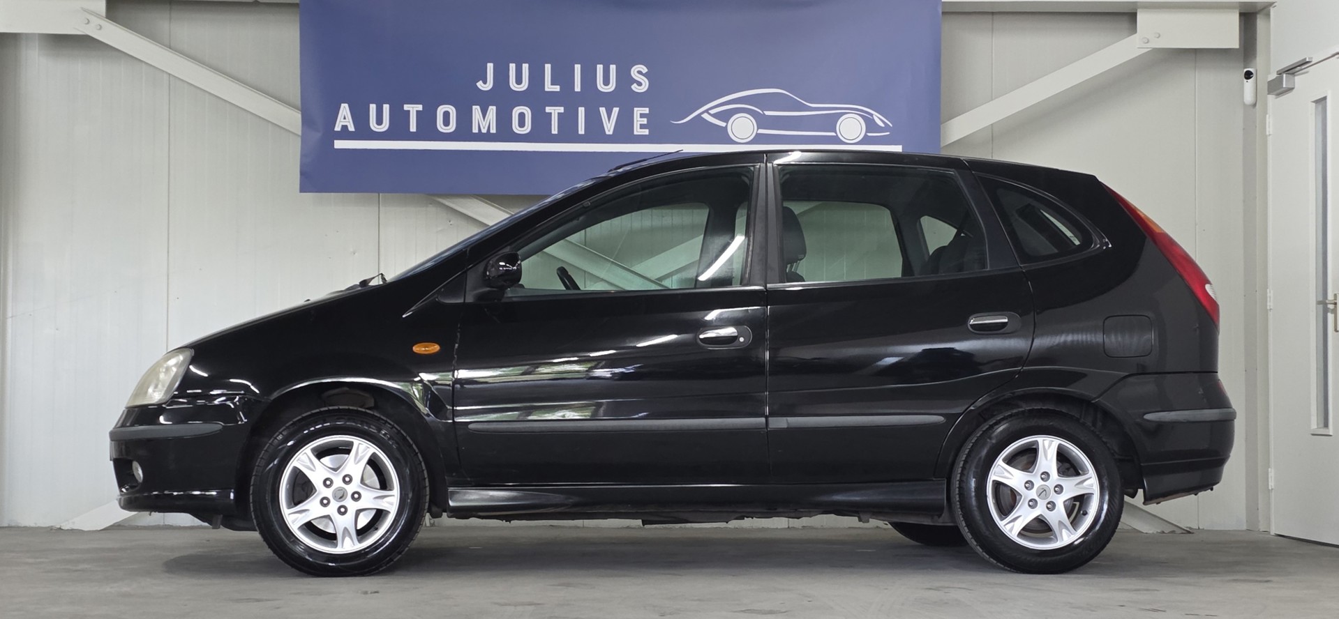 Foto van Nissan Nissan Almera Tino