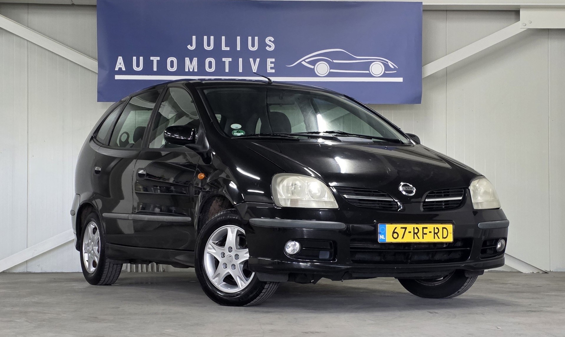 Foto van Nissan Nissan Almera Tino