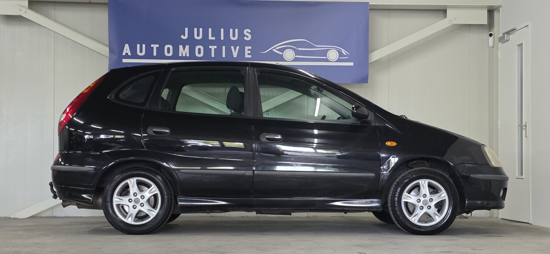 Foto van Nissan Nissan Almera Tino