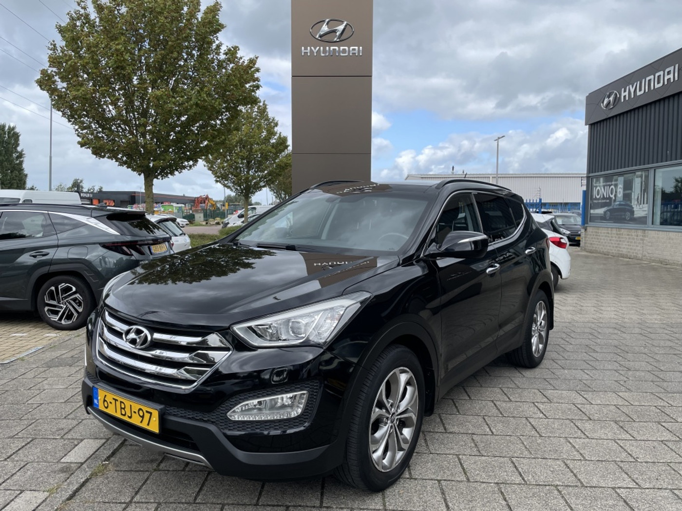 Hyundai Santa Fe 2.4i GDI 4WD i-Catcher 5P*RIJKLAARPRIJS* 2014 - voorkant