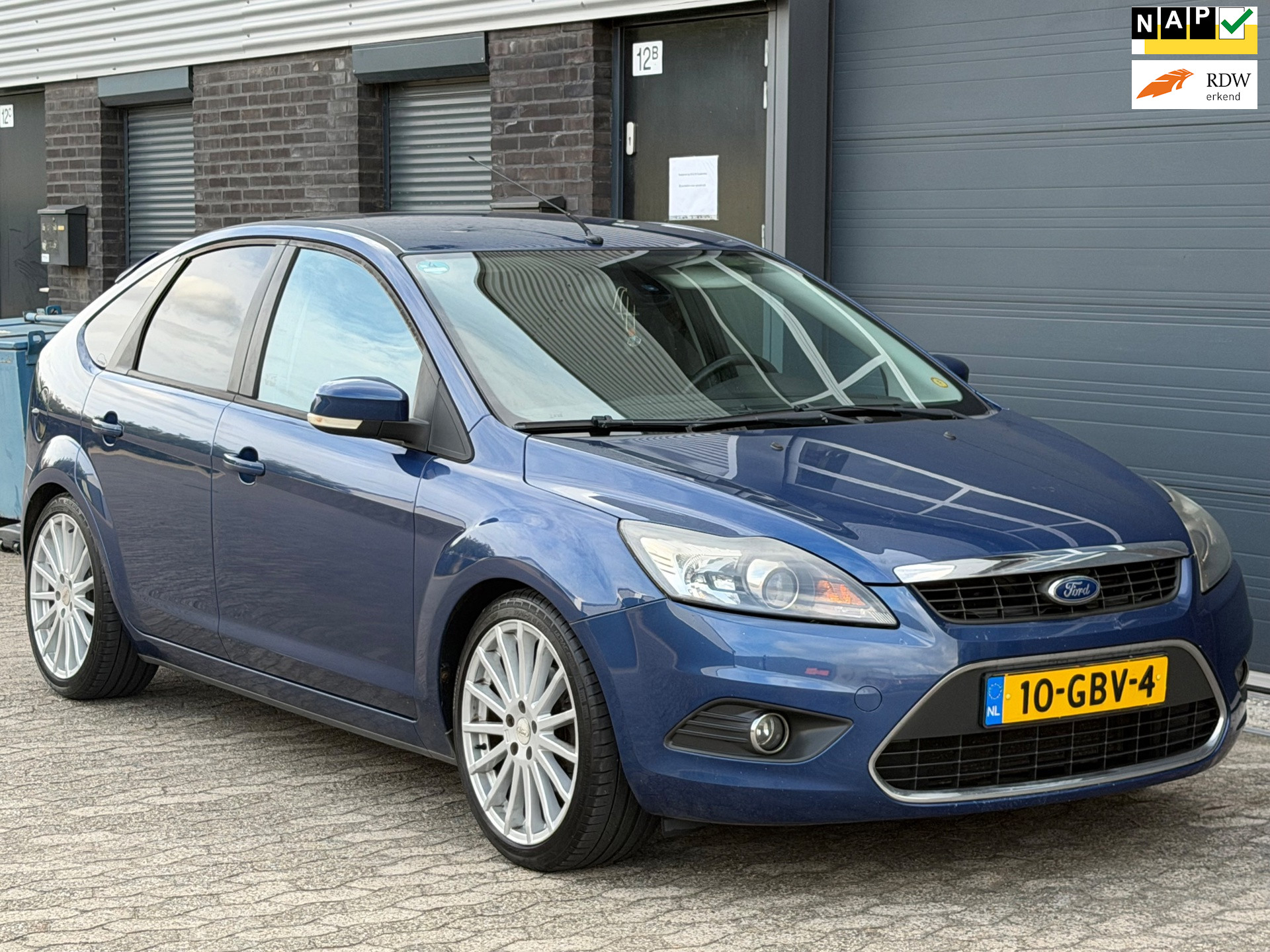 Ford Focus 1.6 Titanium LEER NAVI CLIMA TREKHAAK APK 2008 - voorkant