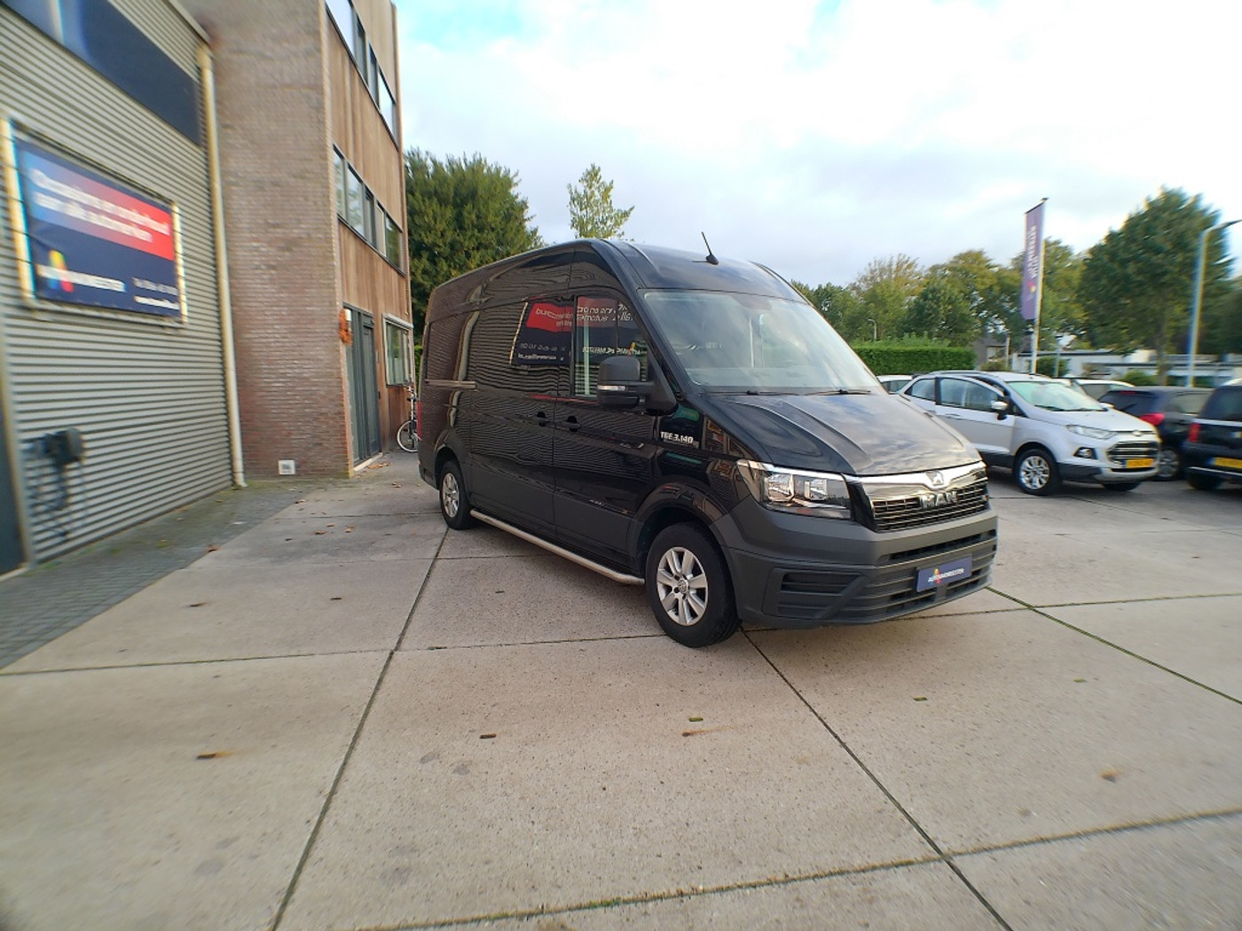 Foto van Man Tge