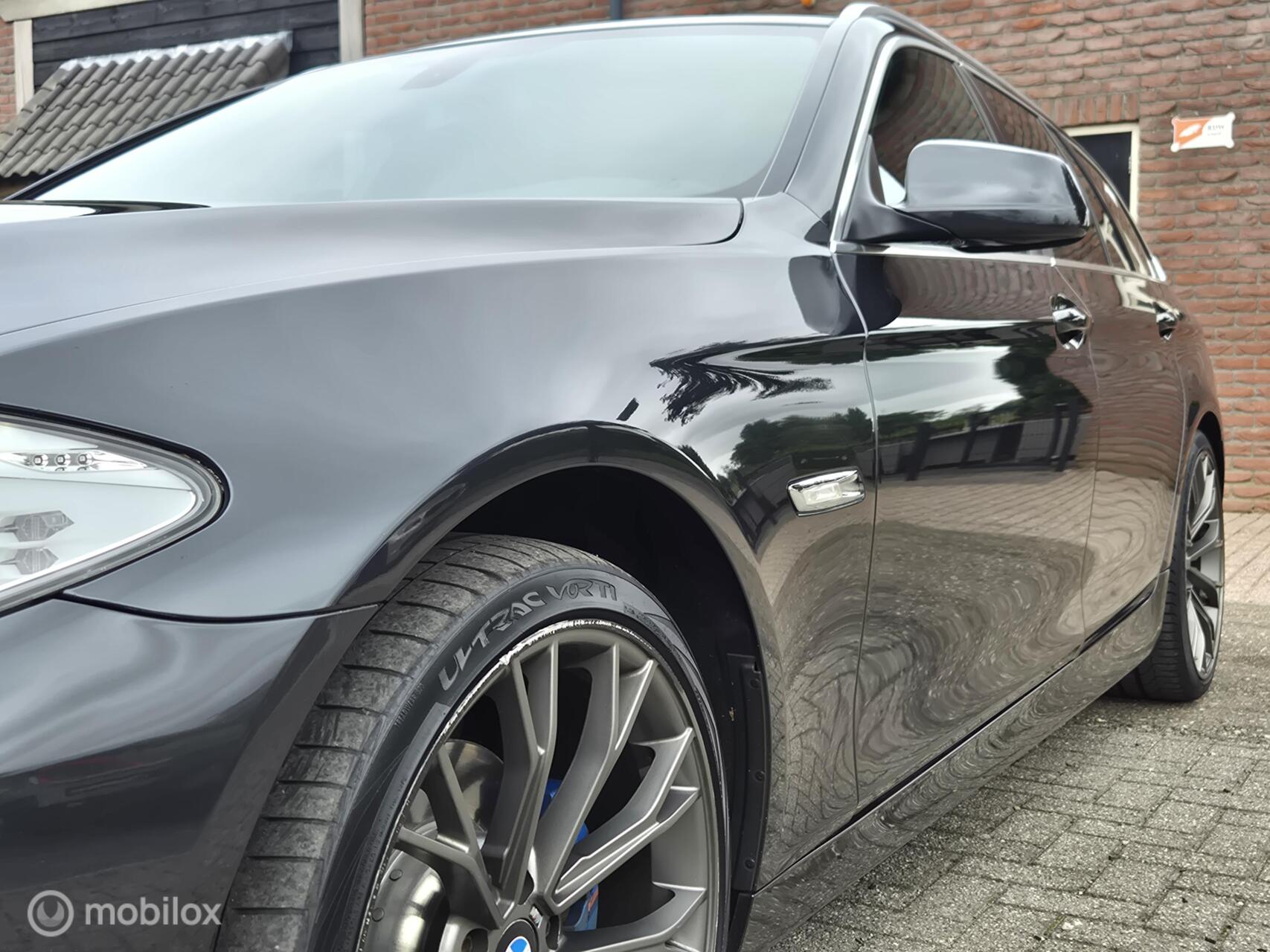 Foto van BMW 523i