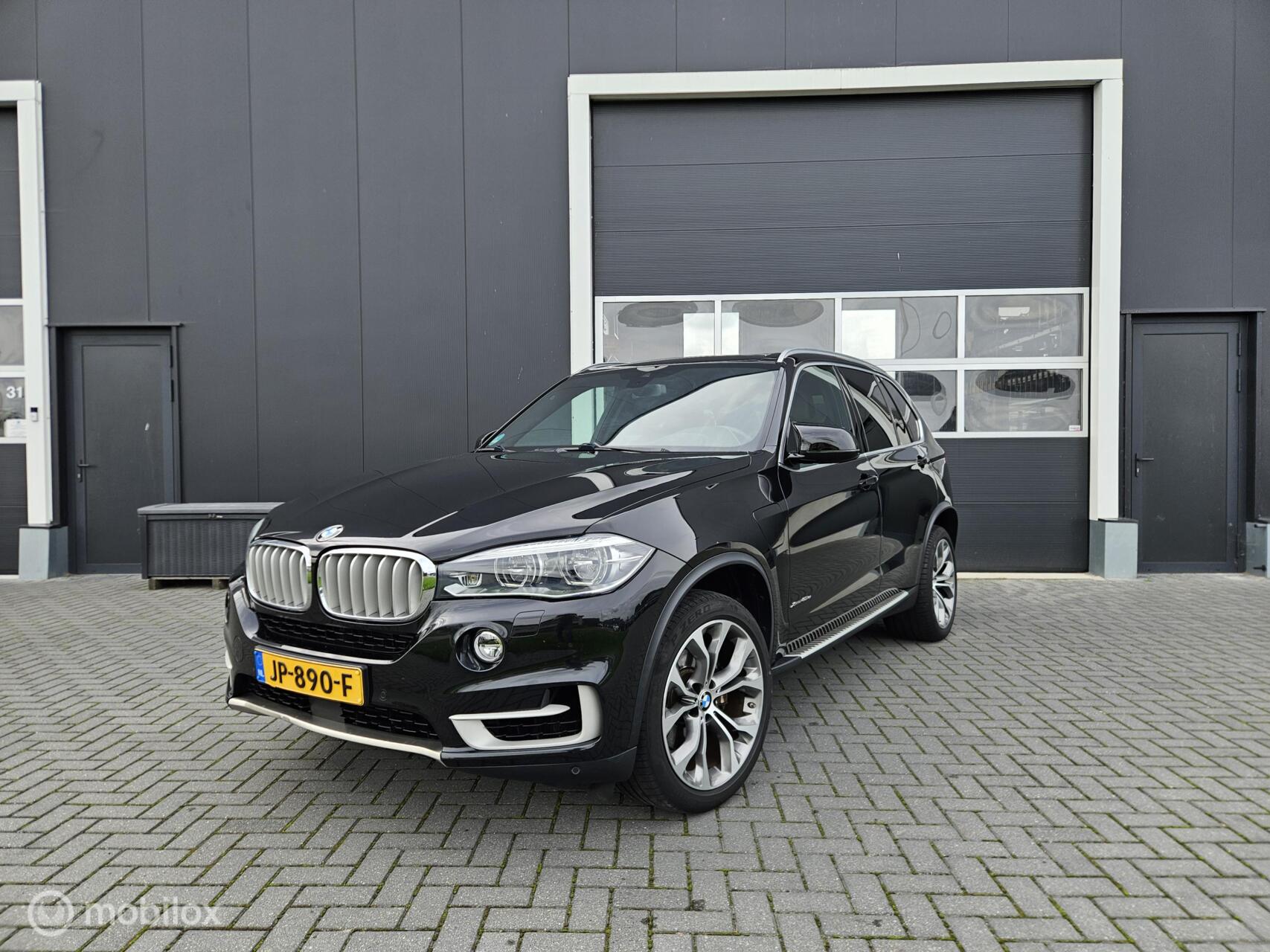 BMW X5 Xdrive40e 40e High Executive 313PK Pano | ACC | LED | HK | 3e Eig 2015 - voorkant