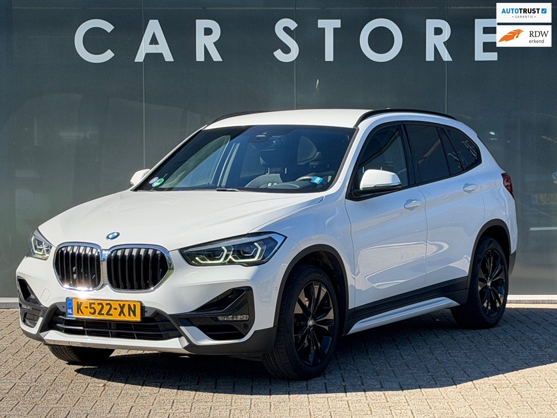 BMW X1 Sdrive18i SDrive18i High Executive CAMERA CARPLAY NAV TREKHAAK 2020 - voorkant